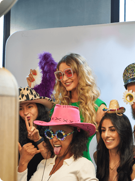 A group of people wearing hats and sunglasses.