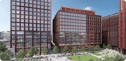 A rendering of a group of buildings in a city.