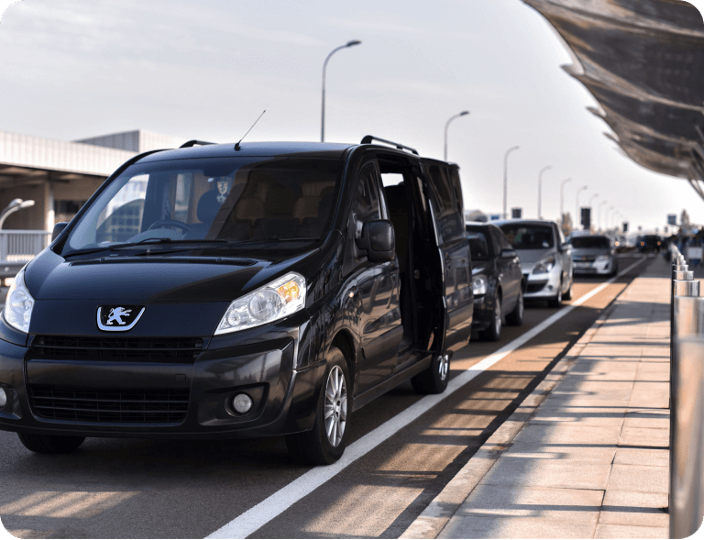 A van is parked on the side of the road.